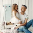 Father playing with a little daughter